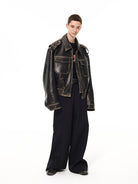 UNKNOWNWORLD Distressed Padded Eco Leather Jacket in Black - On Model