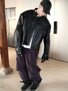 UNKNOWNWORLD Structured Cowhide Biker Jacket in Black - On Model