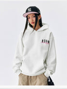 MEDM Embroidered Logo Fleece Hoodie in White - On Model