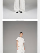 Blindnoplan Heavyweight Curved Leg Sweatpants in White - On Model