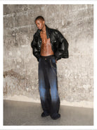 Triangle Project Boxy Faux Leather Padded Jacket in Black - On Model