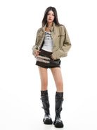 BIGGOLD STUDIO Washed Denim Biker Jacket in Beige - On Model #color_beige