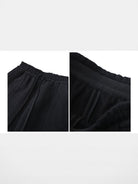 Roolrren Homme Textured Wool Drawstring Trousers in Black - Detail