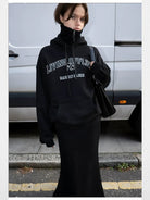 RARELY ALIKE Zip Up High Neck Wool Knit in Black - On Model