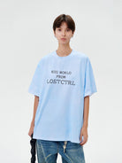 LOSTCTRL Cross Stitch Graphic Tee in Sky Blue - On Female Model