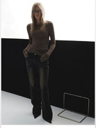 ACSENSE STUDIO Whiskered Micro Flare Jeans in Black - On Model