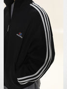 MasonPrince Striped Half Zip Sweatshirt in Black - On Male Model