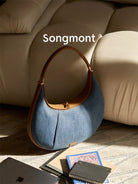 Songmont Denim Leather Crescent Bag in Blue - Lifestyle