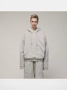 LOSTCTRL Embroidered Raw Edge Cotton Hoodie in Gray - On Model