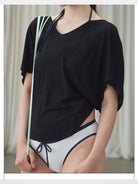 RARELY ALIKE Tie Back Lyocell Batwing Top in Black - On Model