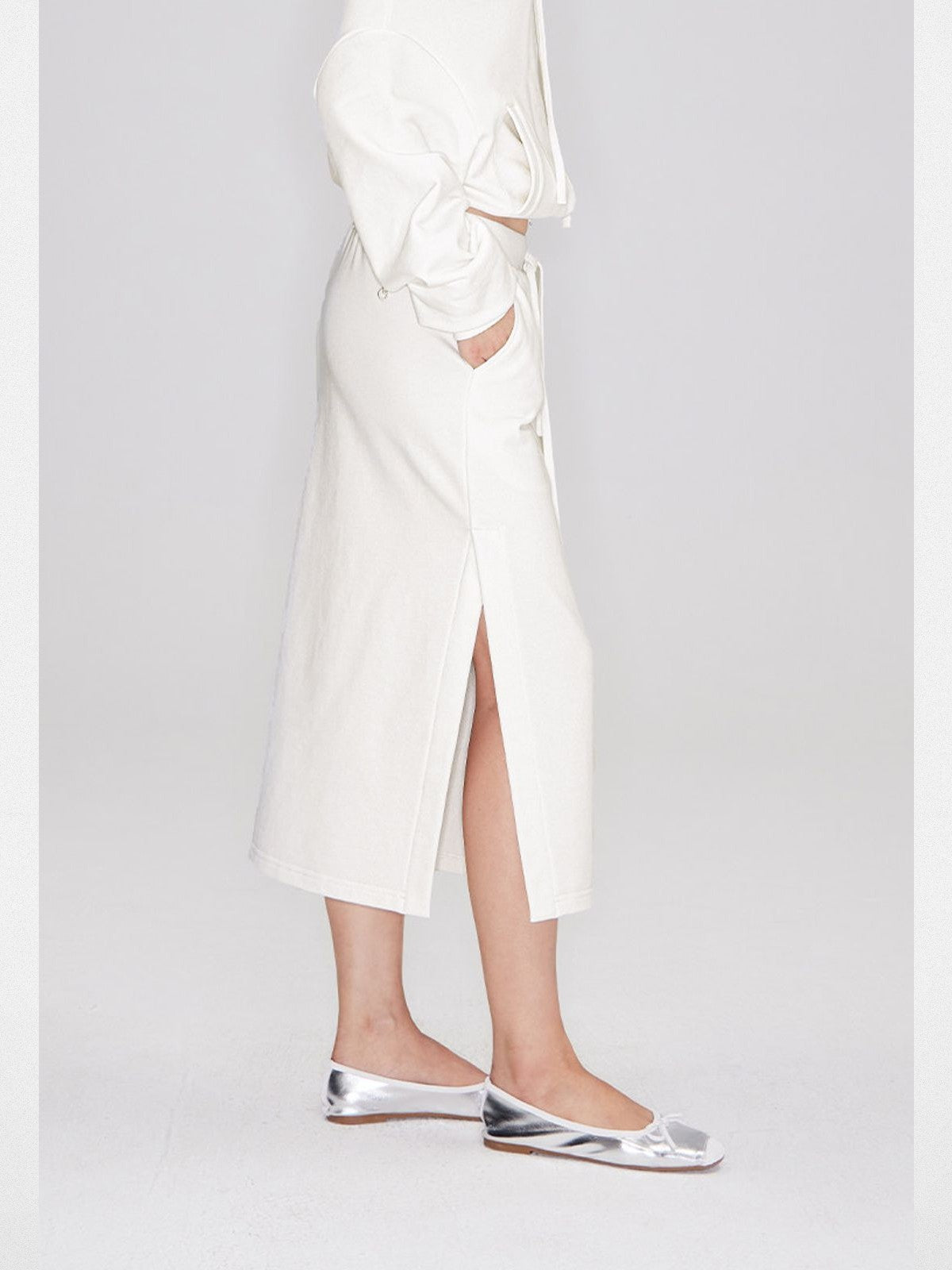RARELY ALIKE Side Slit Cotton Sweatshirt Skirt in White - On Model