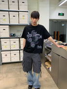 NeverSeez Retro Balloon Print Cotton T Shirt in Black - On Male Model