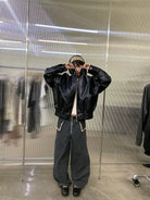 NeverSeez Stand Collar Faux Leather Jacket in Black - On Female Model