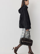 RandomPiece Stowable Hood Triacetate Jacket in Black - On Model