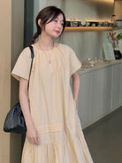 RandomPiece Eco Cotton Hemp Tiered Maxi Dress in Cream - On Model