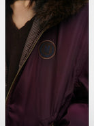 MASONPRINCE Faux Fur Hooded Puffer Bomber in Burgundy - On Female Model