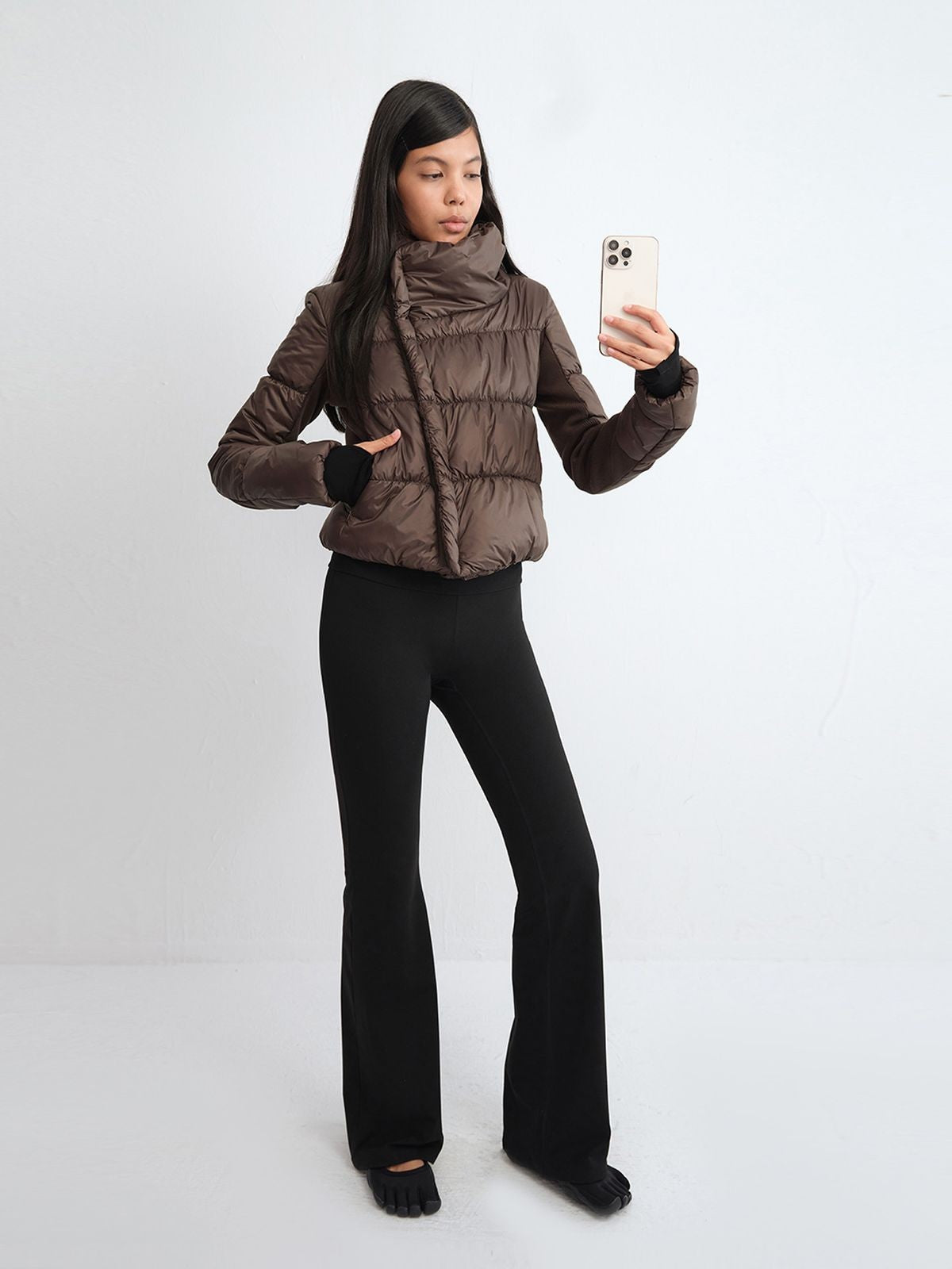 RARELY ALIKE Asymmetric Quilted Puffer Jacket in Brown - On Model