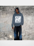 TRIANGLE PROJECT Heavyweight Distressed Graphic Hoodie in Gray - On Model