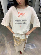 NeverSeez Snake Bow Print T Shirt in White - On Model