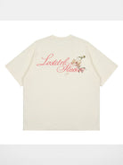 LOSTCTRL Camellia Graphic Print T Shirt in Cream