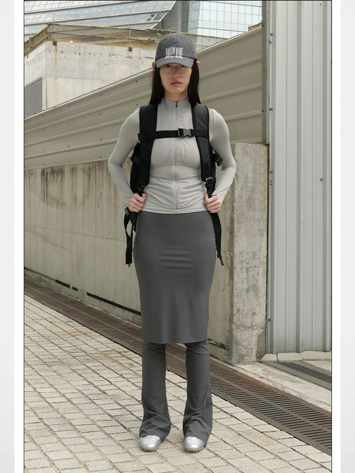 RARELY ALIKE Skirted Micro Flare Trousers in Dark Gray - On Model
