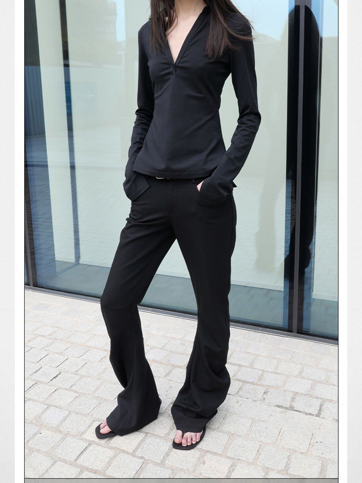 RARELY ALIKE Curved Leg Flared Suit Pants in Black - On Model