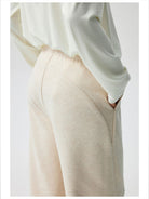 Simple Project Curved Seam Drawstring Sweatpants in Beige - On Model