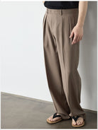 Roolrren Homme Pleated Wool Trousers in Beige - On Model
