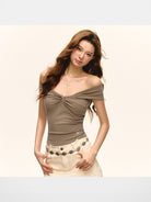 Ariseism Twisted Off Shoulder Top in Beige - On Model