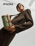 FION Coated Canvas Lock Clasp Boston Bag in Mint - On Male Model