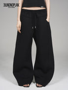 Blindnoplan Heavyweight Curved Leg Sweatpants in Black - On Model