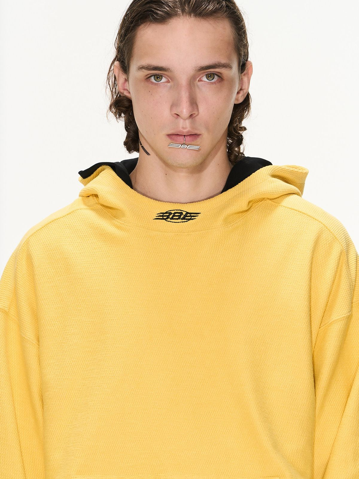BLINDNOPLAN Distorted Silhouette Cotton Hoodie in Yellow - On Model