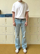 VLABMADE Ice Blue Distressed Micro Flare Jeans in Blue - On Model