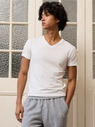 Retro 21 Anti Wrinkle V Neck T Shirt in White - On Model