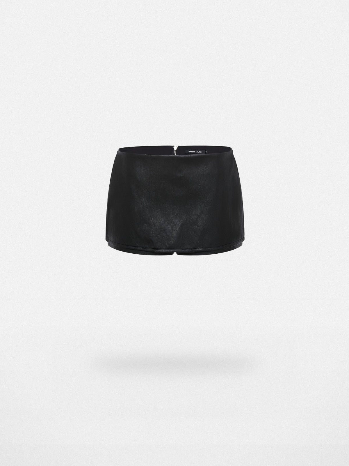 RARELY ALIKE Side Zip Faux Leather Skort in Black