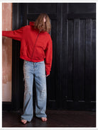 VLABMADE Distressed Sashiko Flare Jeans in Blue - On Model