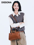 DISSONA Leather Top Handle Boston Bag in Brown - On Female Model