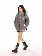 BIGGOLD STUDIO Retro Stand Collar Varsity Jacket in Gray - On Model #color_gray