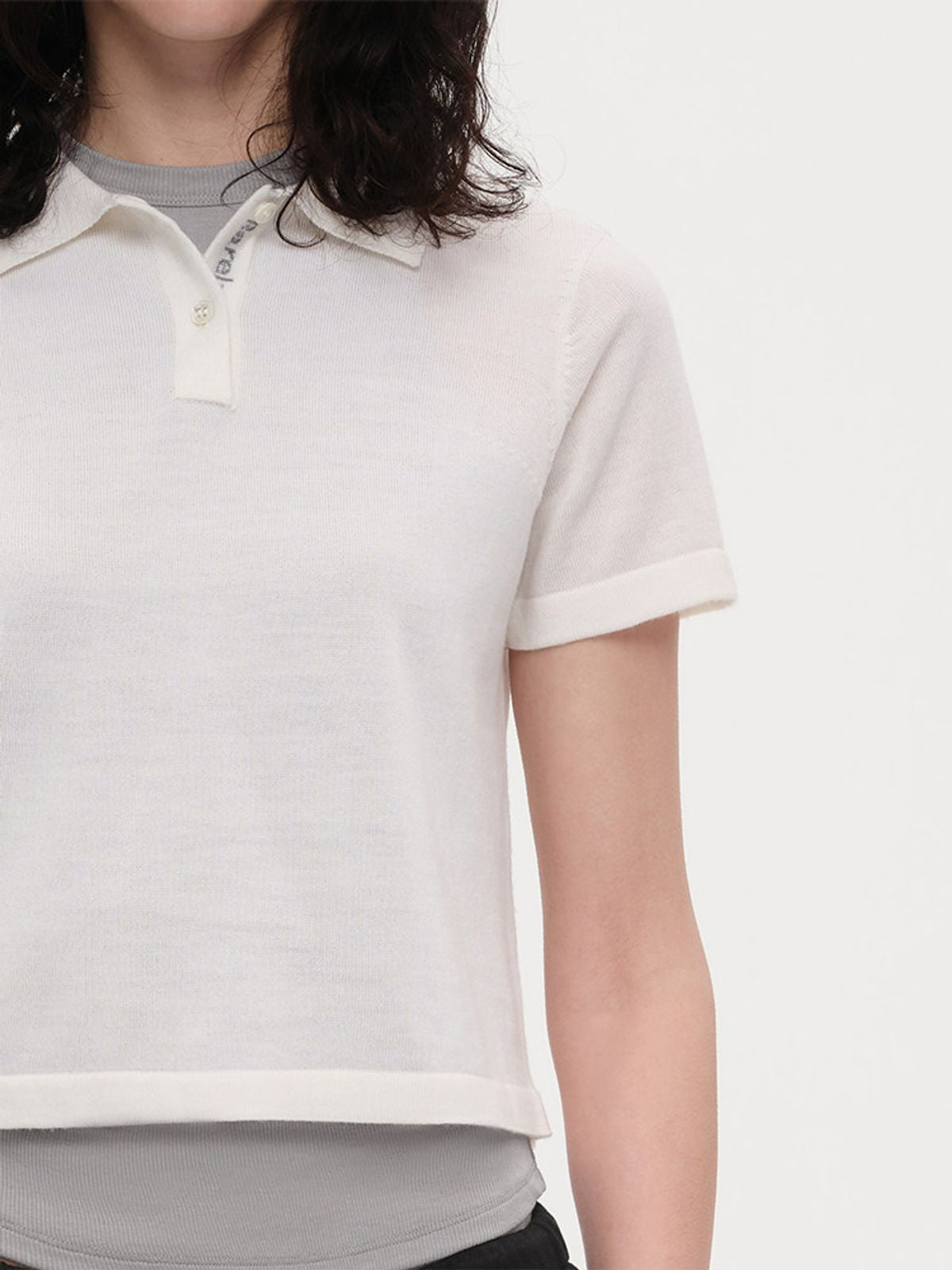 Rarely Alike Pure Wool Logo Jacquard Polo in White - On Model