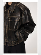 UNKNOWNWORLD Distressed Padded Eco Leather Jacket in Black - On Model
