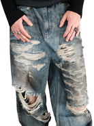 UNKNOWNWORLD Distressed Boro Mud Dyed Jeans in Denim - On Model
