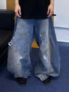 Triangle Project Distressed Dirty Dye Patchwork Jeans in Denim - On Model