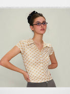 Amee Checkered Mesh Zip Front Polo in Yellow - On Model