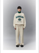 NANS Heavyweight Cotton Varsity Sweatshirt in White - On Model