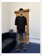 TRIANGLE PROJECT Distressed Dirty Wash Micro Flare Jeans in Denim - On Model