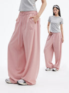MEDM Cooling Wide Leg Track Pants in Pink - On Female Model