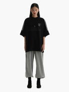 MasonPrince Oversized Raglan Football Tee in Black (Black) - On Female Model