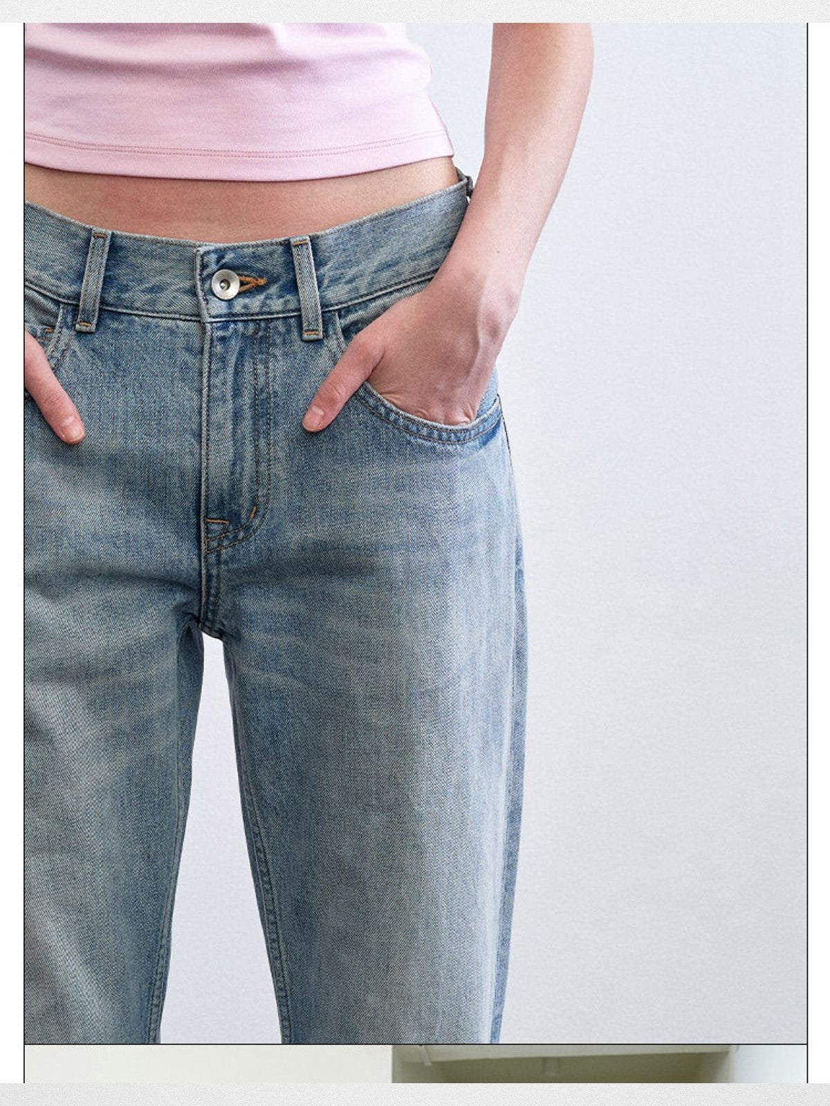 RARELY ALIKE Mid Rise Asymmetric Hem Flared Jeans in Sky Blue - On Model