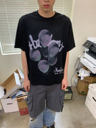 NeverSeez Retro Balloon Print Cotton T Shirt in Black - On Male Model