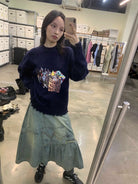 NeverSeez Asymmetric Vintage Wash Denim Skirt in Blue - On Model